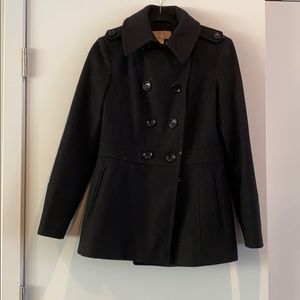 Double breasted black trench coat